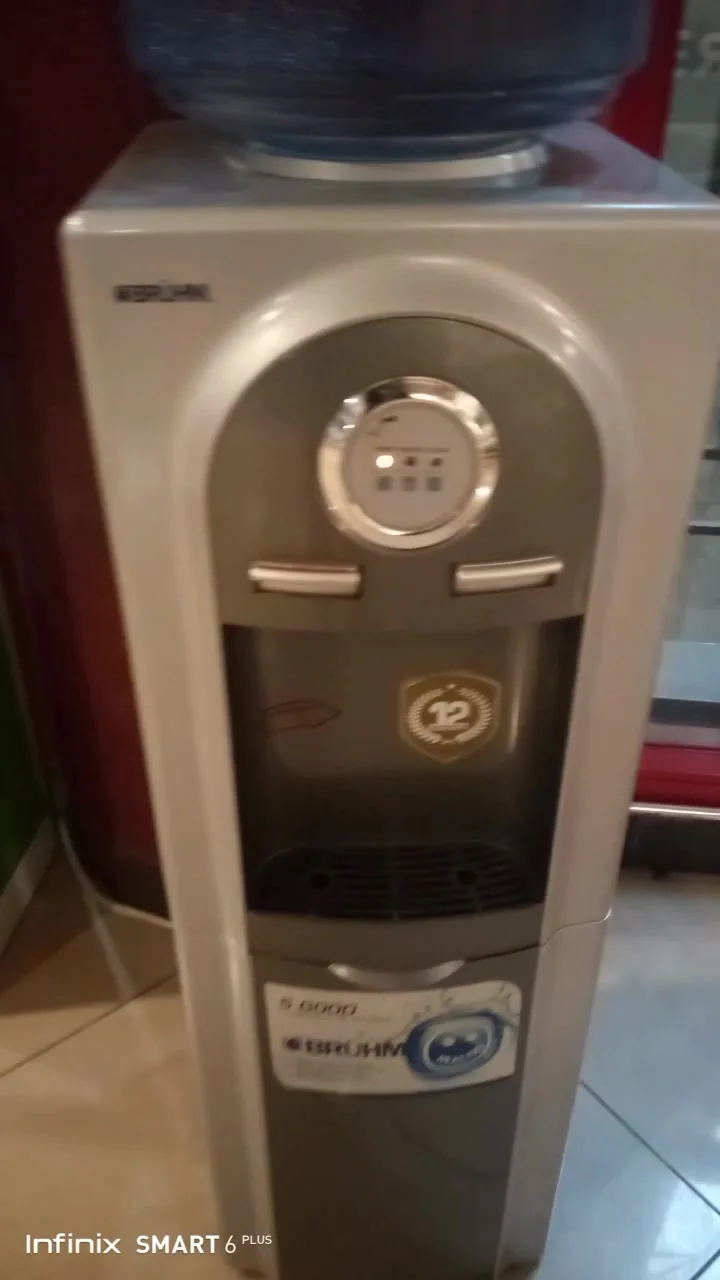 Silver Bruhm water dispenser on a repair visit