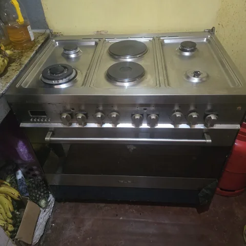 Elba stainless steel freestanding cooker with gas burners and electric hotplates