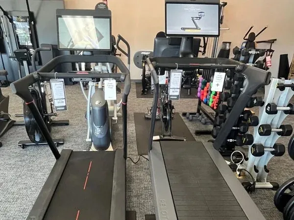 Gym floor with treadmills and weights